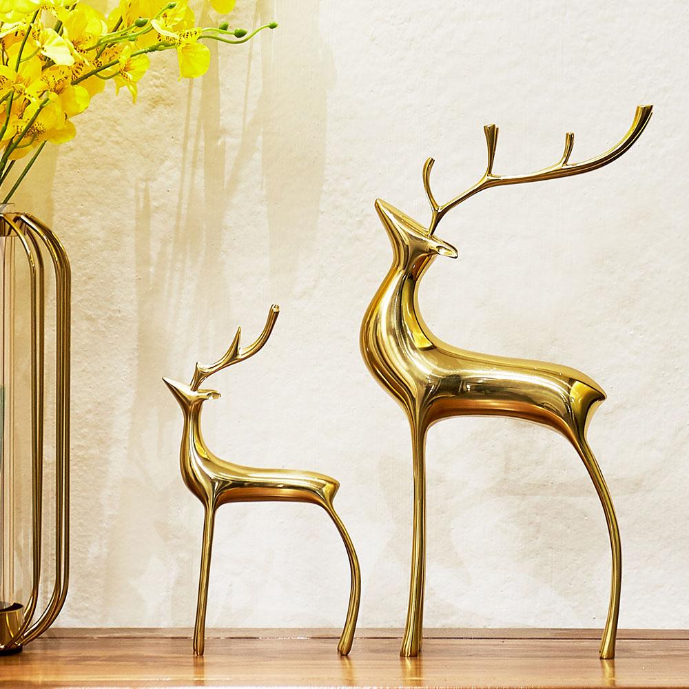 Figurines décoratives de rennes dorés