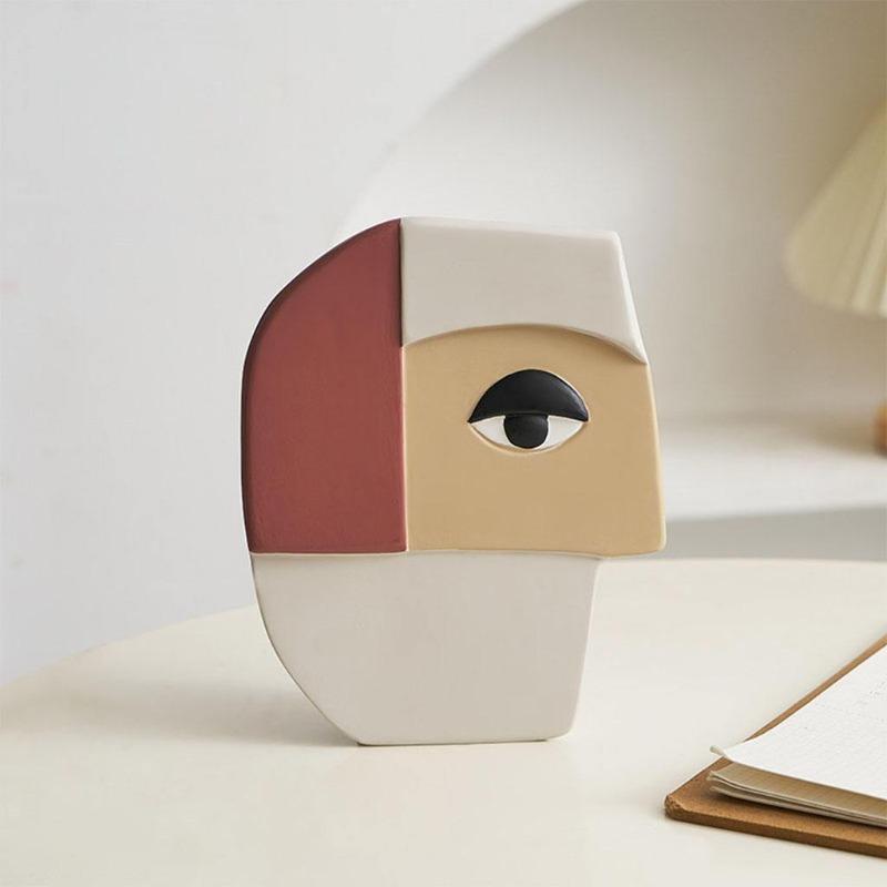 Vase visage humain abstrait
