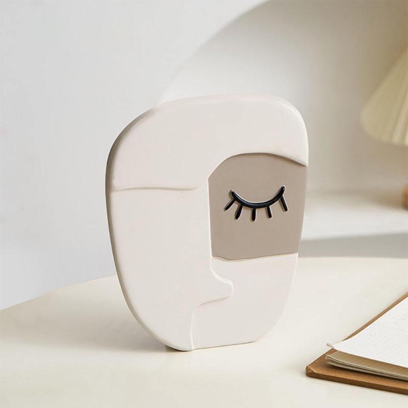 Vase visage humain abstrait