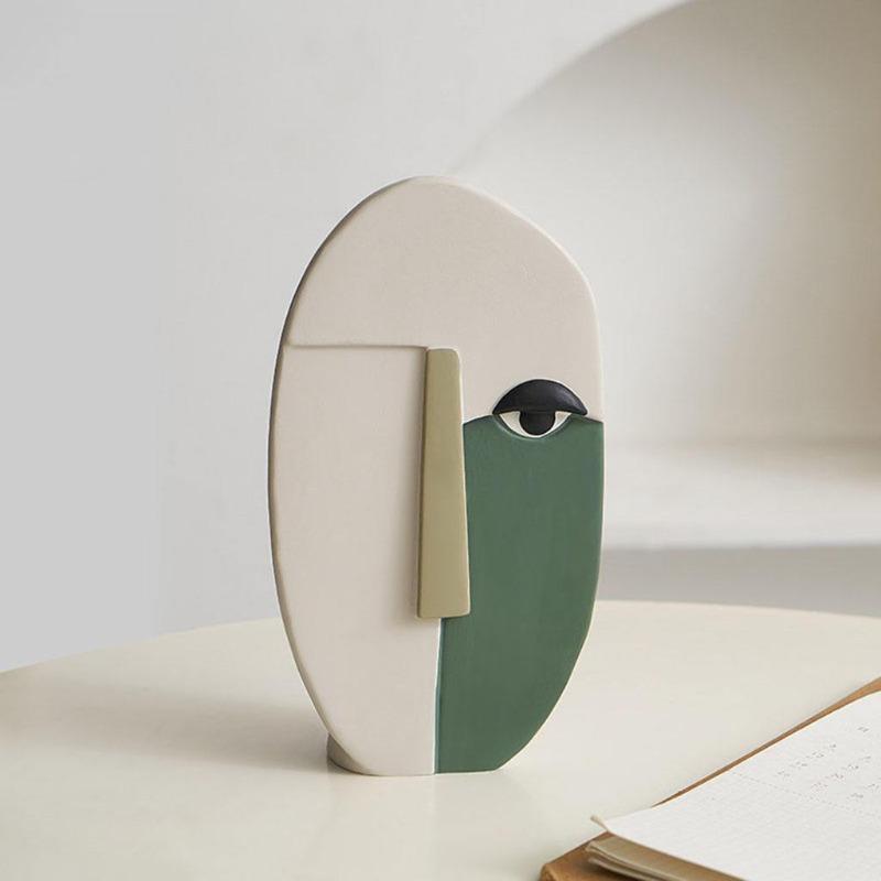 Vase visage humain abstrait