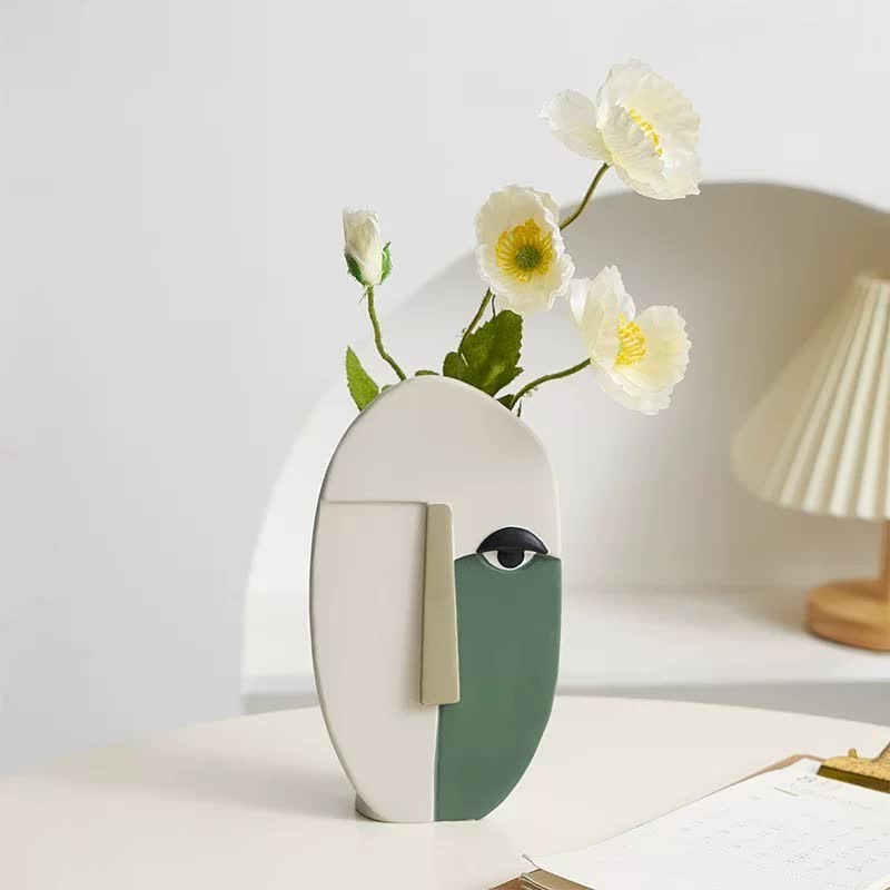 Vase visage humain abstrait