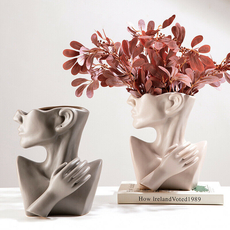 Vase de plantes en céramique visage de femme