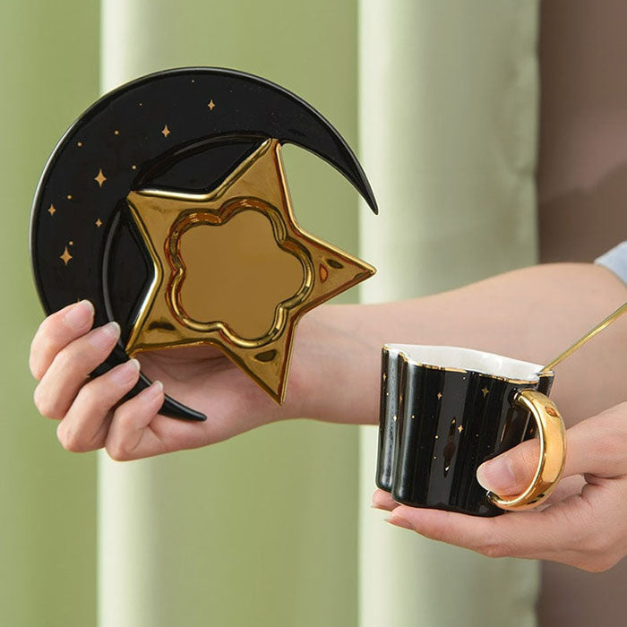 Coffee cup with a spoon, saucer with a star-moon design