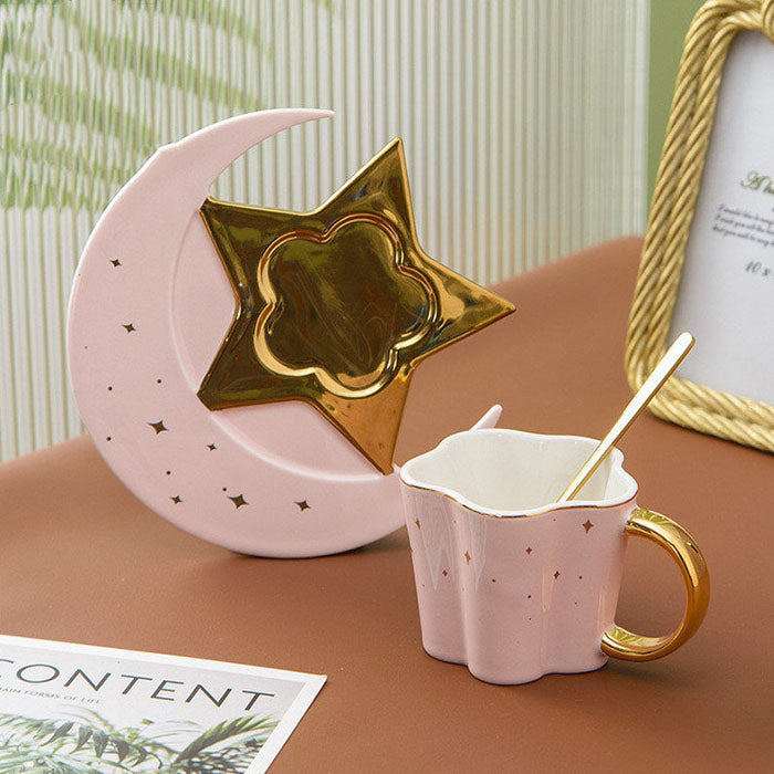 Coffee cup with a spoon, saucer with a star-moon design