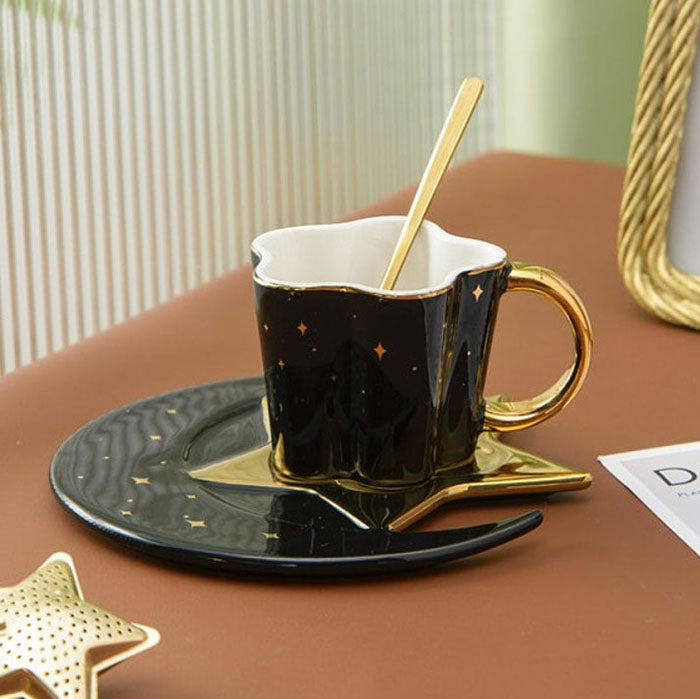 black color, coffee cup with a spoon, saucer with a star-moon design