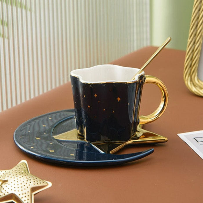 dark blue color, coffee cup with a spoon, saucer with a star-moon design
