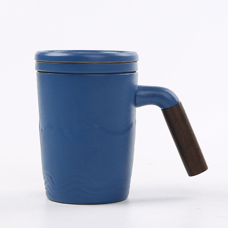 The tall skinny tea mug with lid, saucer and handle, blue color