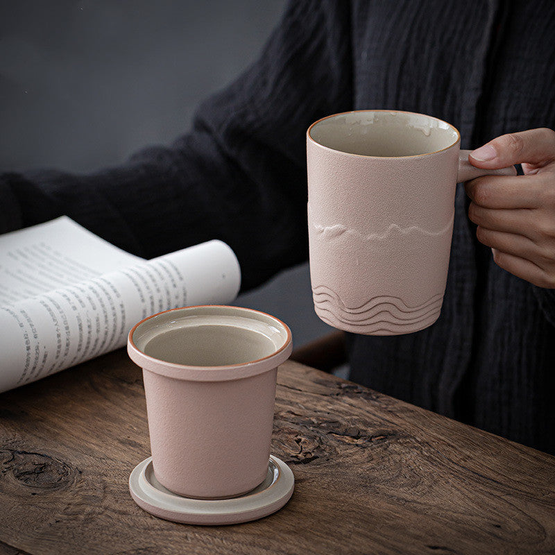 The tall skinny tea mug with lid, saucer and handle, pink color