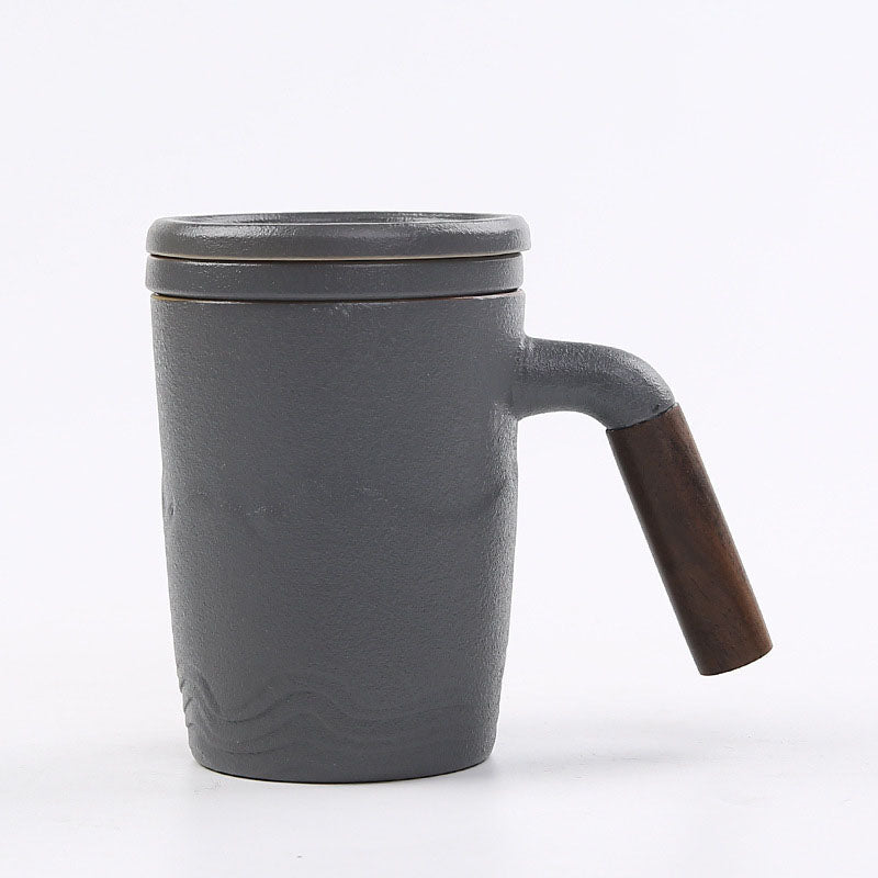 The tall skinny tea mug with lid, saucer and handle, gray color