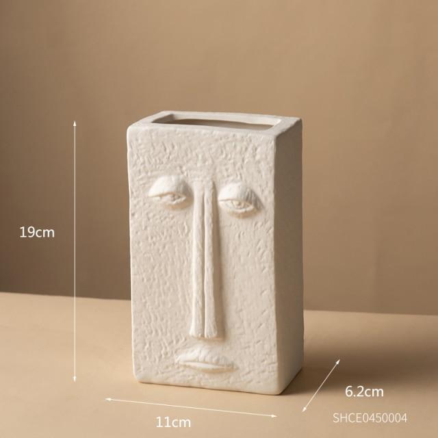 Vase visage abstrait en céramique
