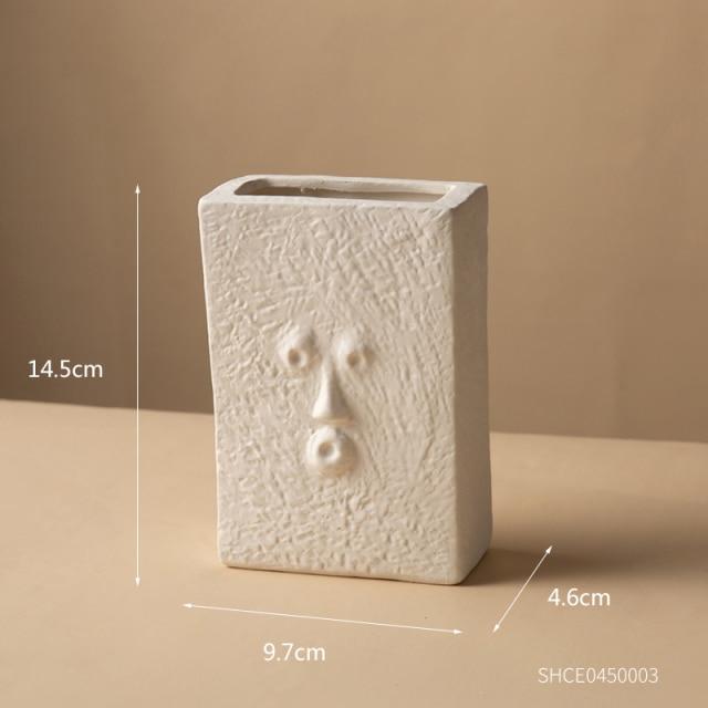 Vase visage abstrait en céramique