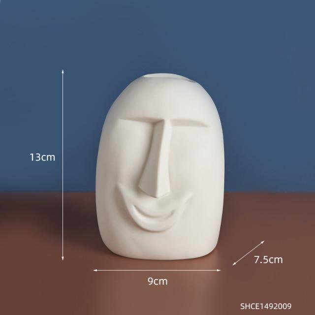 Vase visage abstrait en céramique